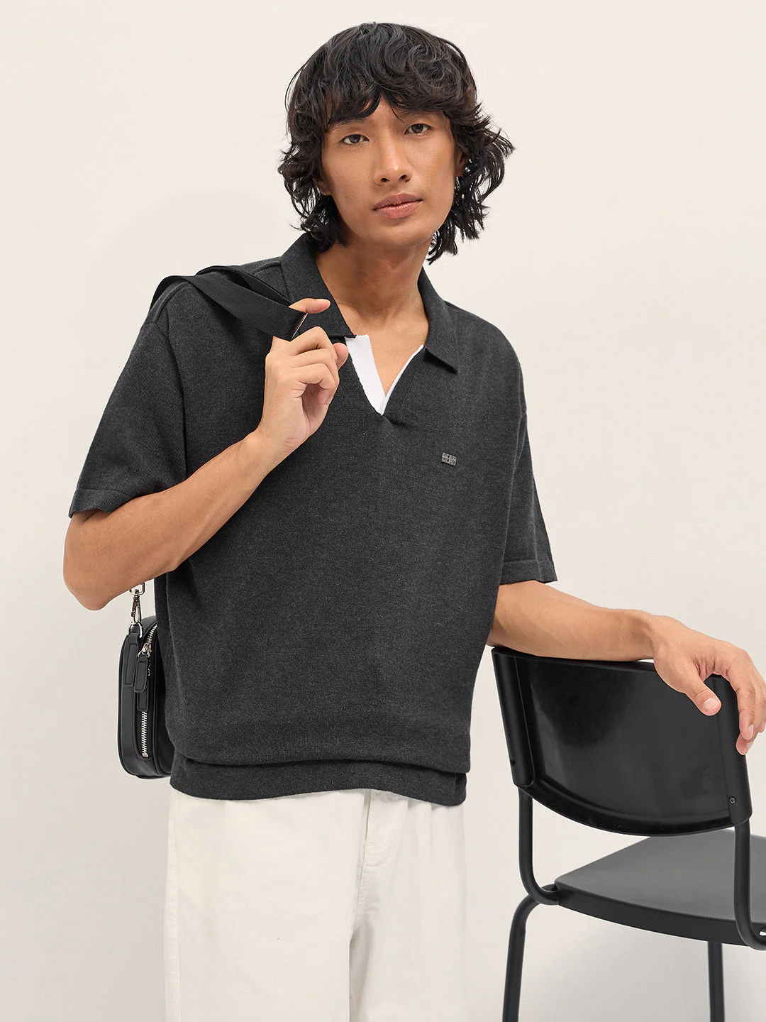 Men Black Solid Relaxed Fit Polo