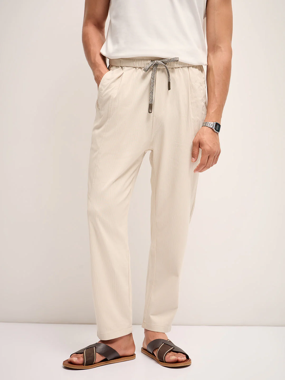 Men Cream Self Design Regular Fit Mid-Rise Casual Pant
