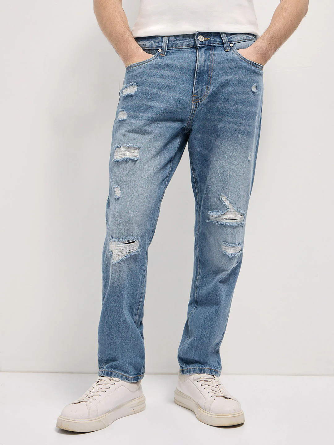 Men Light BlueLight Fade High Distressed Mid-Rise Relaxed Fit Jeans
