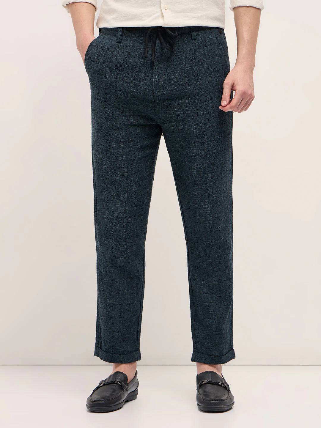 Men Teal Self Design Tapered Fit Elasticated Waist Casual Trouser